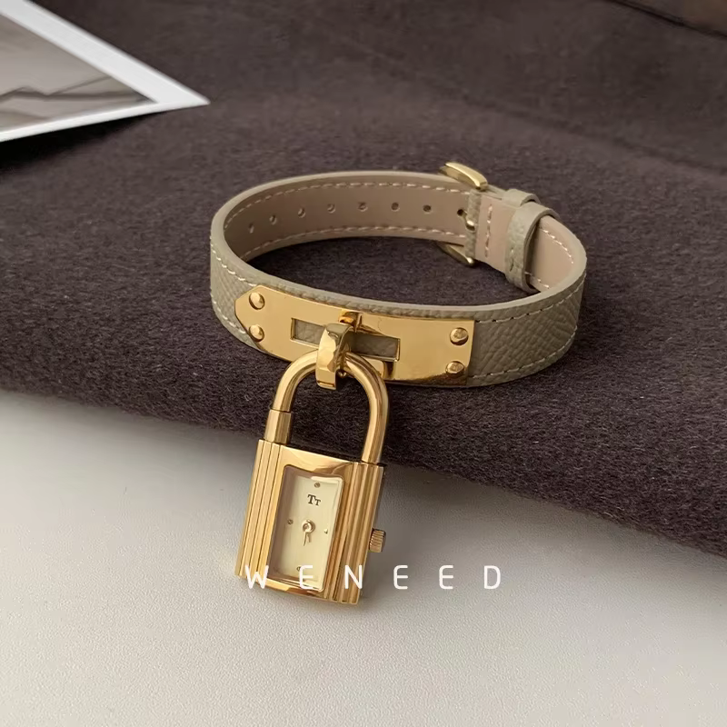 Montre à cadran verrouillable pour femmes personnalité de la mode 2025 nouvelle Niche lumière luxe Q