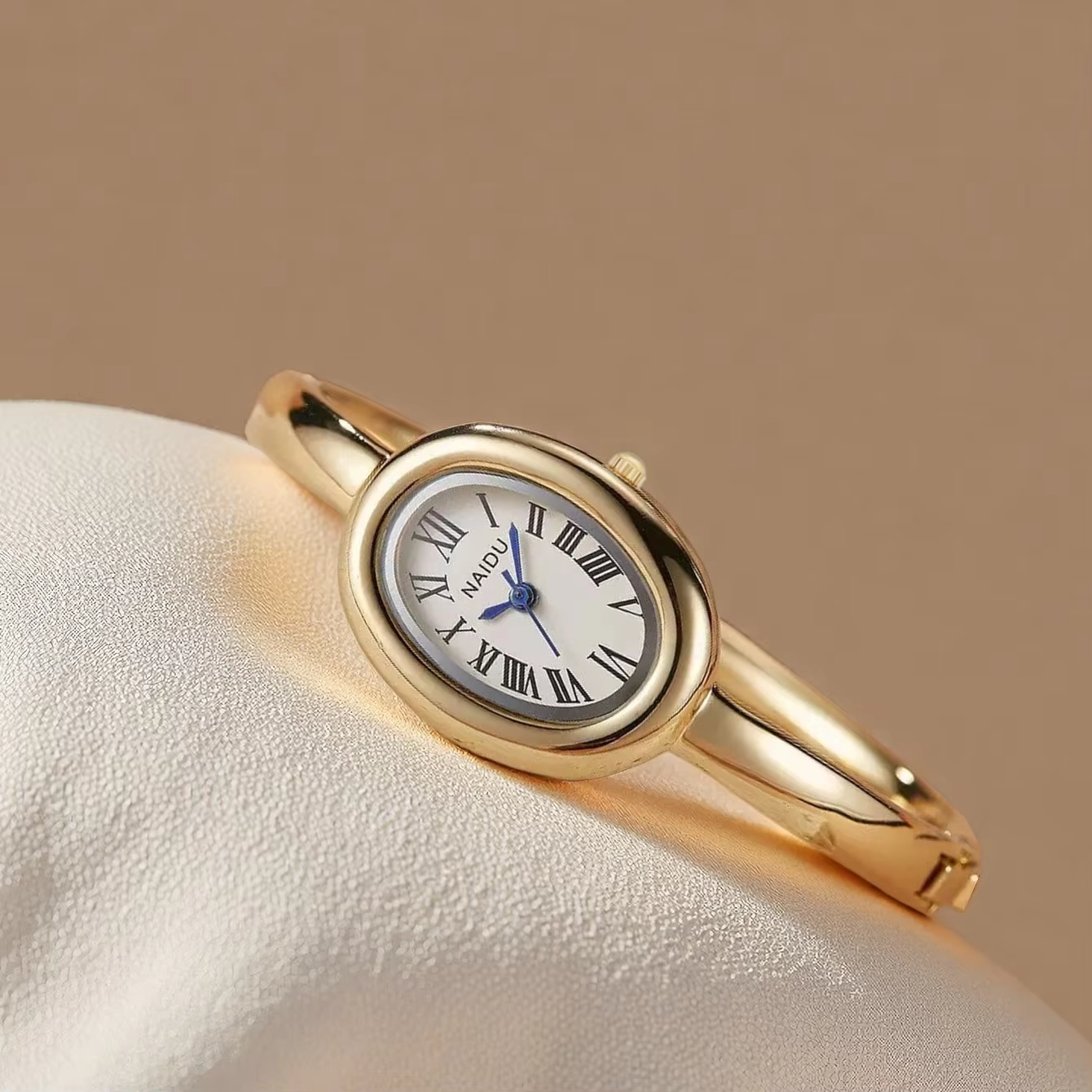 Montre pour femme décontractée, polyvalente, simple et à la mode avec affichage à l'échelle romaine