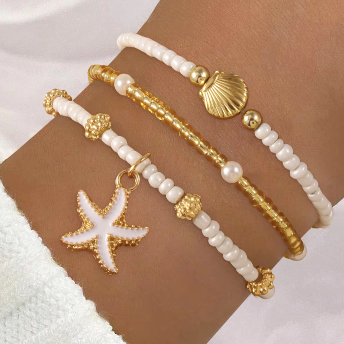 Bracelet en coquillage d'étoile de mer exquis, perles de rocaille faites à la main, plusieurs couche