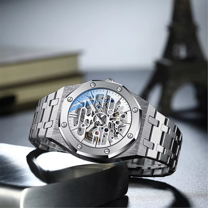 CHENXI haut de gamme évider entièrement automatique montres mécaniques pour hommes argent noir bracelet en acier inoxydable montre pour homme 2025