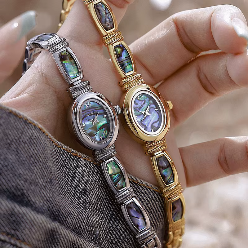 Cadran ovale femmes Bracelet montres haut de gamme de luxe dames