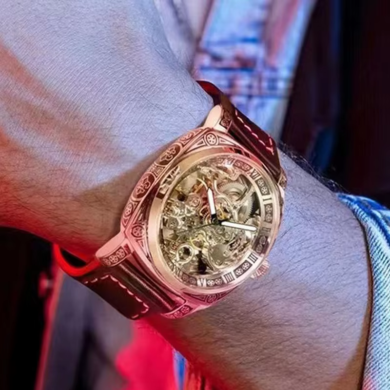 Une montre mécanique creuse à Tourbillon entièrement automatique sculptée lumineuse de Style d'affaires en alliage de Zinc noir pour hommes