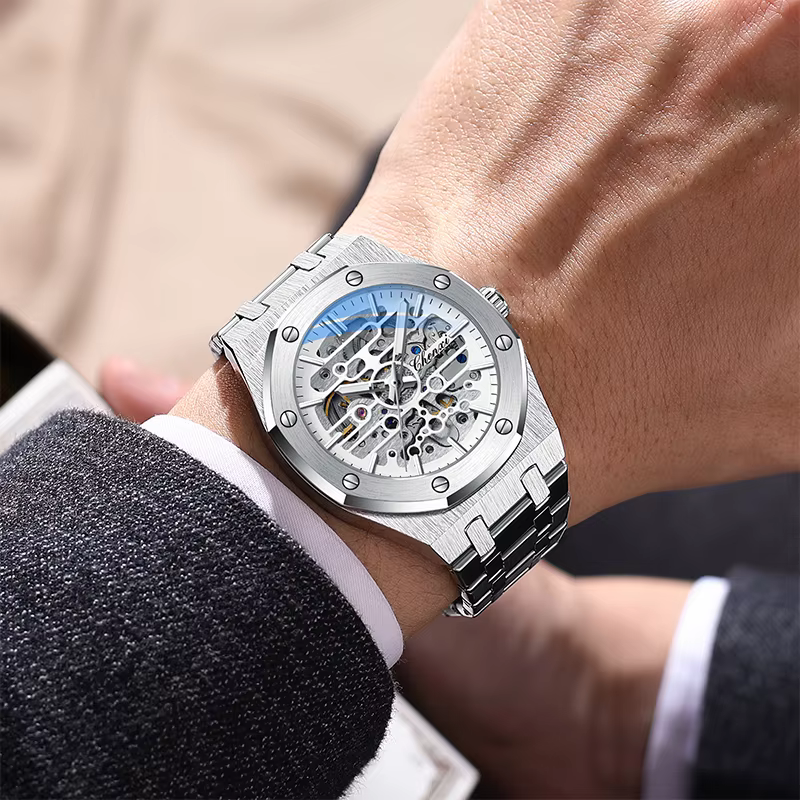 CHENXI haut de gamme évider entièrement automatique montres mécaniques pour hommes argent noir bracelet en acier inoxydable montre pour homme 2025