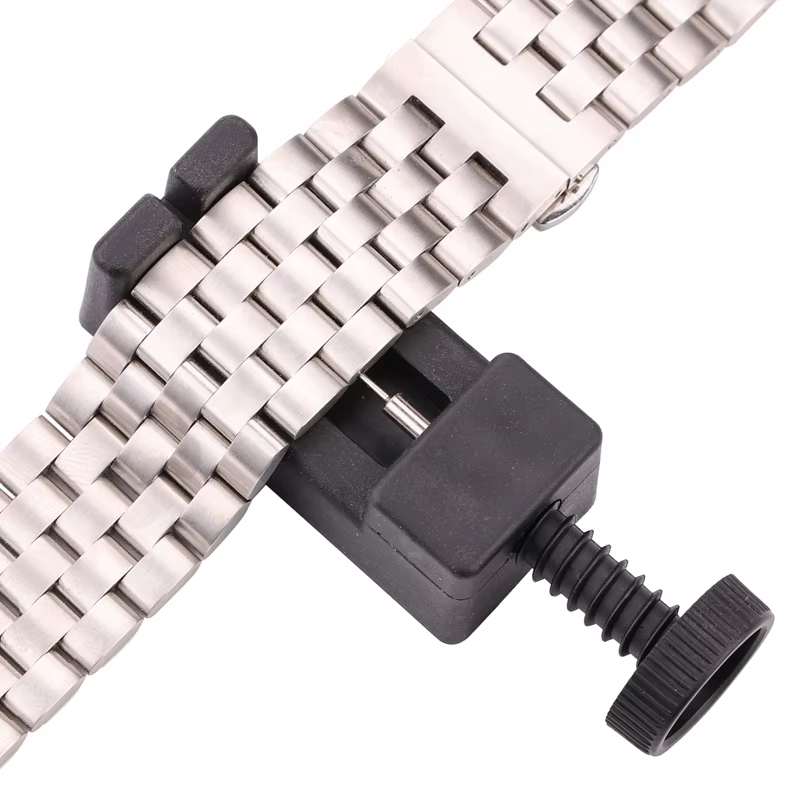Outil de réparation et de réglage de maillons de bracelet de montre