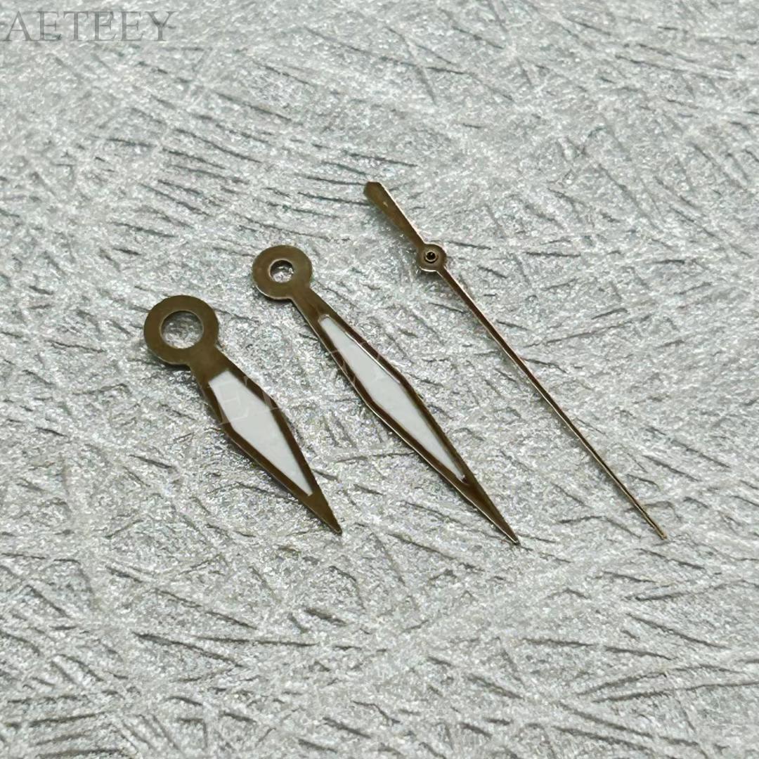 Aiguilles de montre or rose