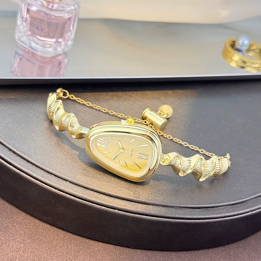 Montre à Quartz élégante en forme de serpent pour femmes