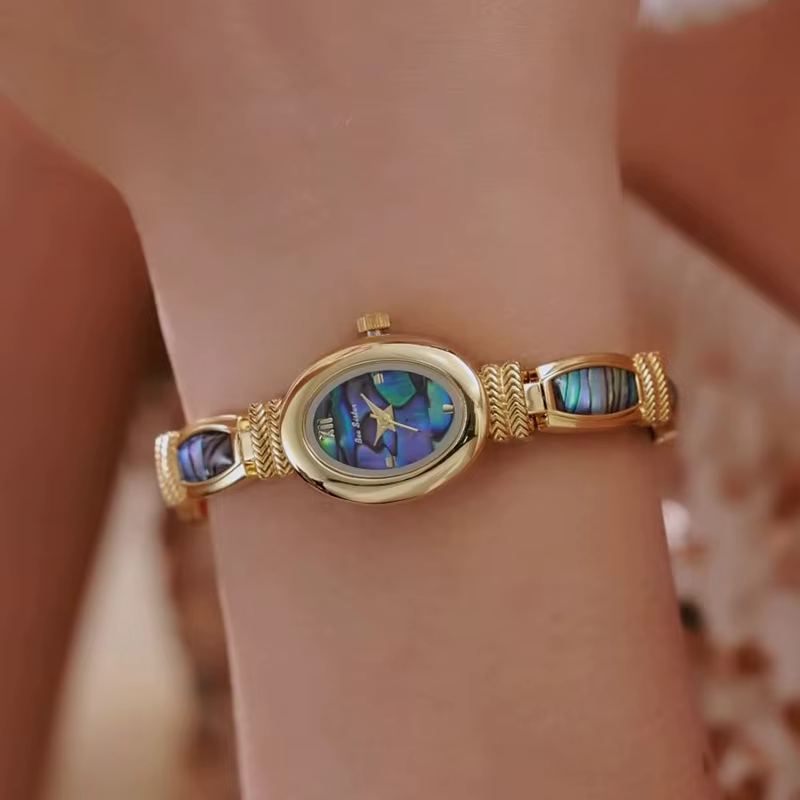 Cadran ovale femmes Bracelet montres haut de gamme de luxe dames