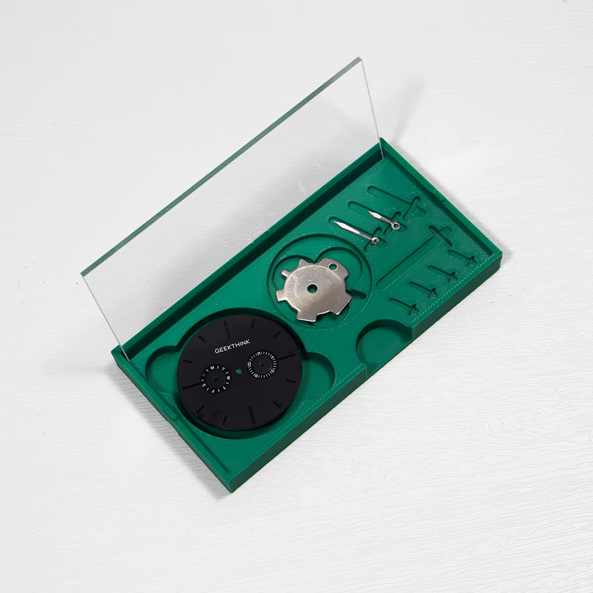 Boîte de rangement pour pièces de montre