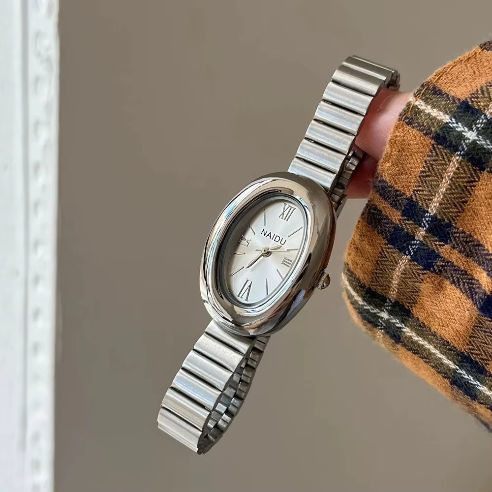 Montres ovales pour femmes avec bracelet en acier inoxydable