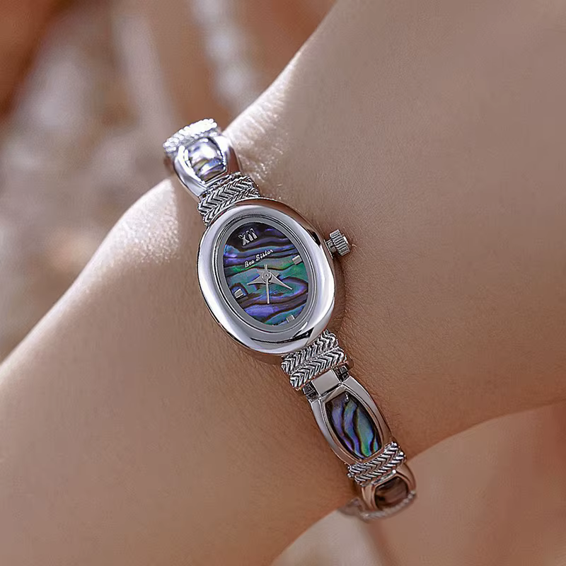 Cadran ovale femmes Bracelet montres haut de gamme de luxe dames