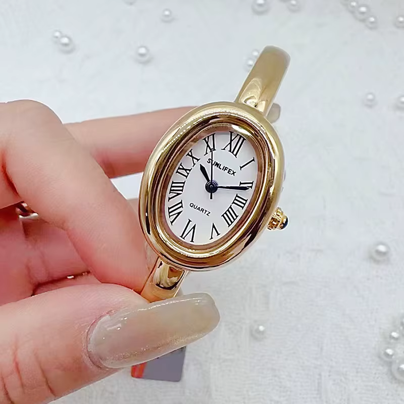 Marque de luxe femmes Rome cadran Montre à Quartz mode or couleurs bracelet montre-bracelet Relogio Feminino livraison