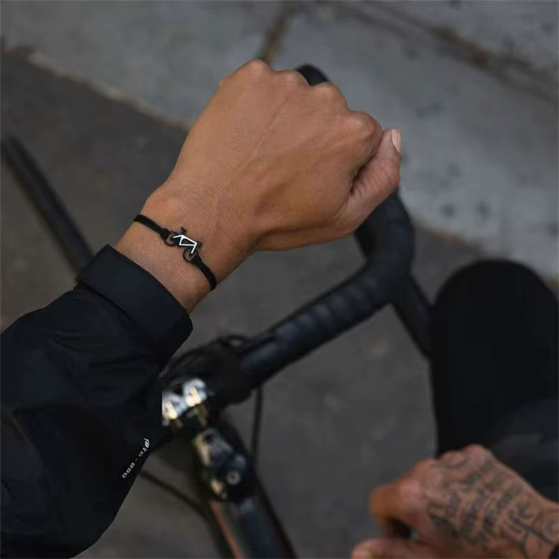 Bracelet de cyclisme de couleur noir rose
