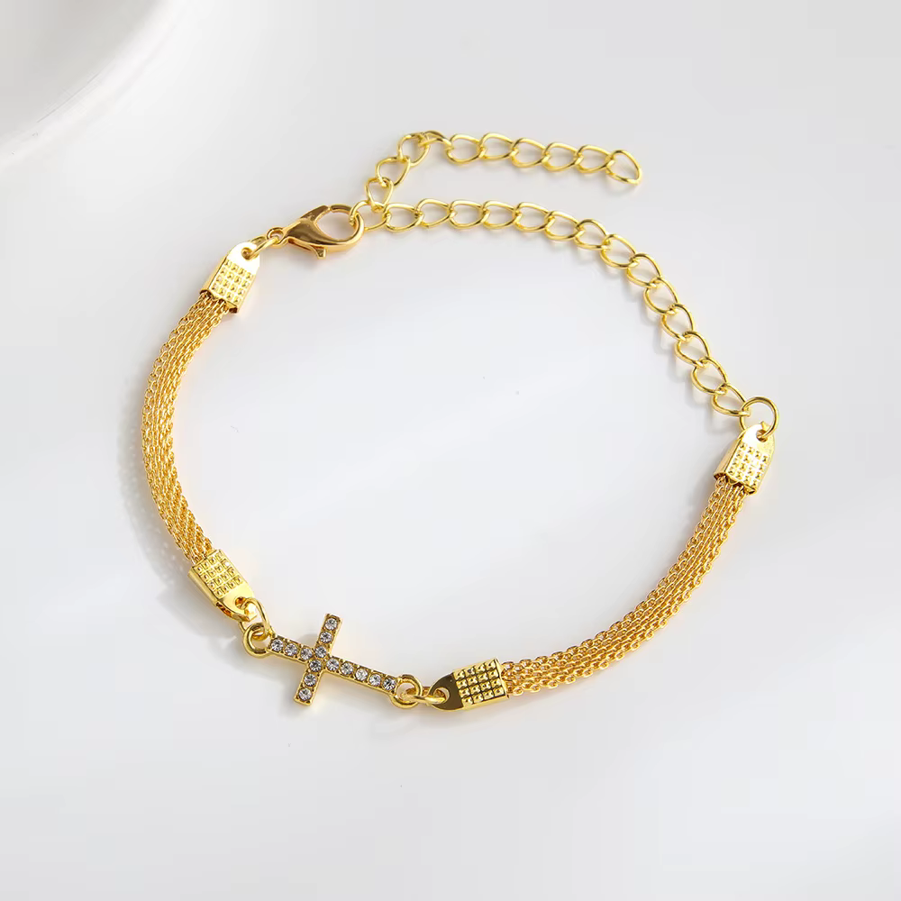 Bracelet en alliage avec strass en forme de croix
