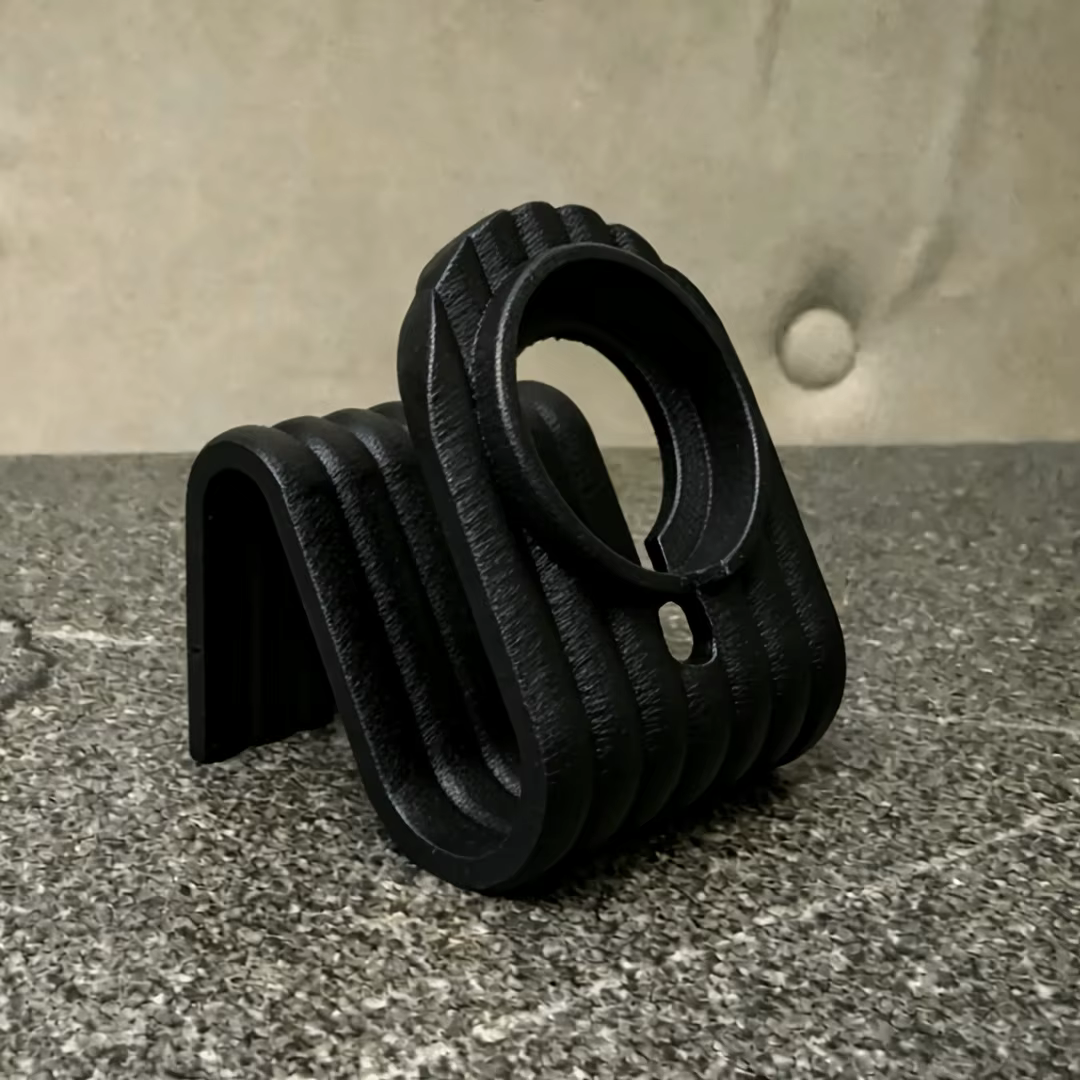 Station de charge pour Apple Watch au design minimaliste ondulé