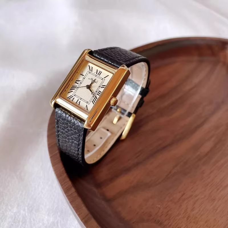 Montre pour femme de luxe Quartz Vintage plaqué or numéro romain H cadran bracelet en cuir