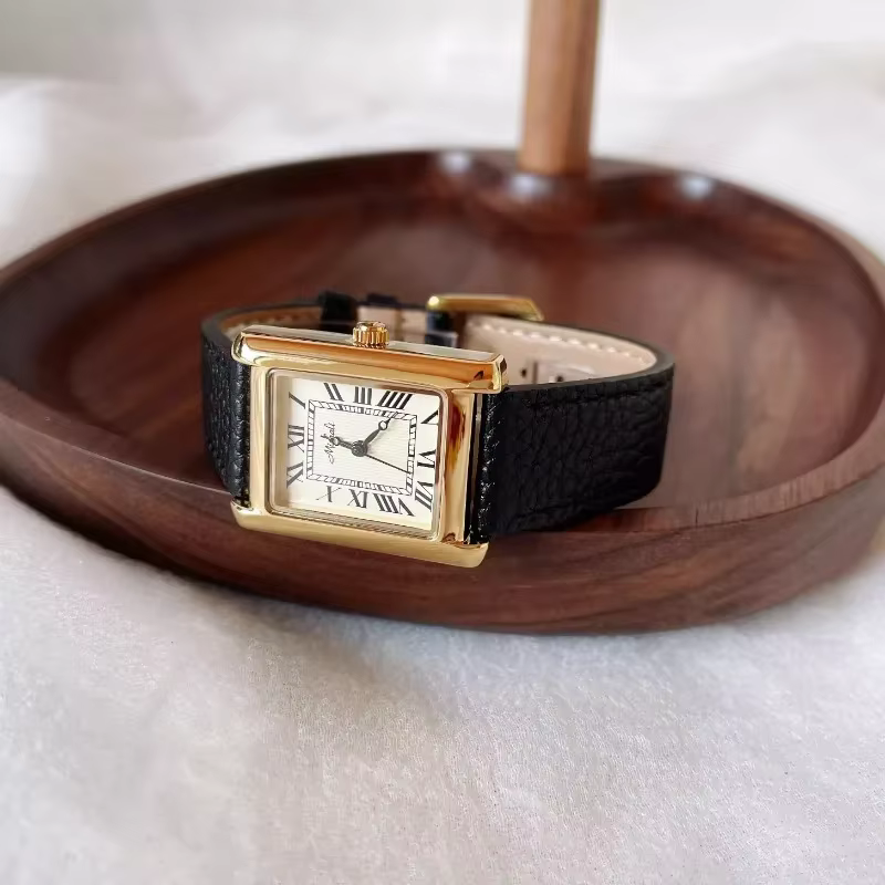 Montre pour femme de luxe Quartz Vintage plaqué or numéro romain H cadran bracelet en cuir