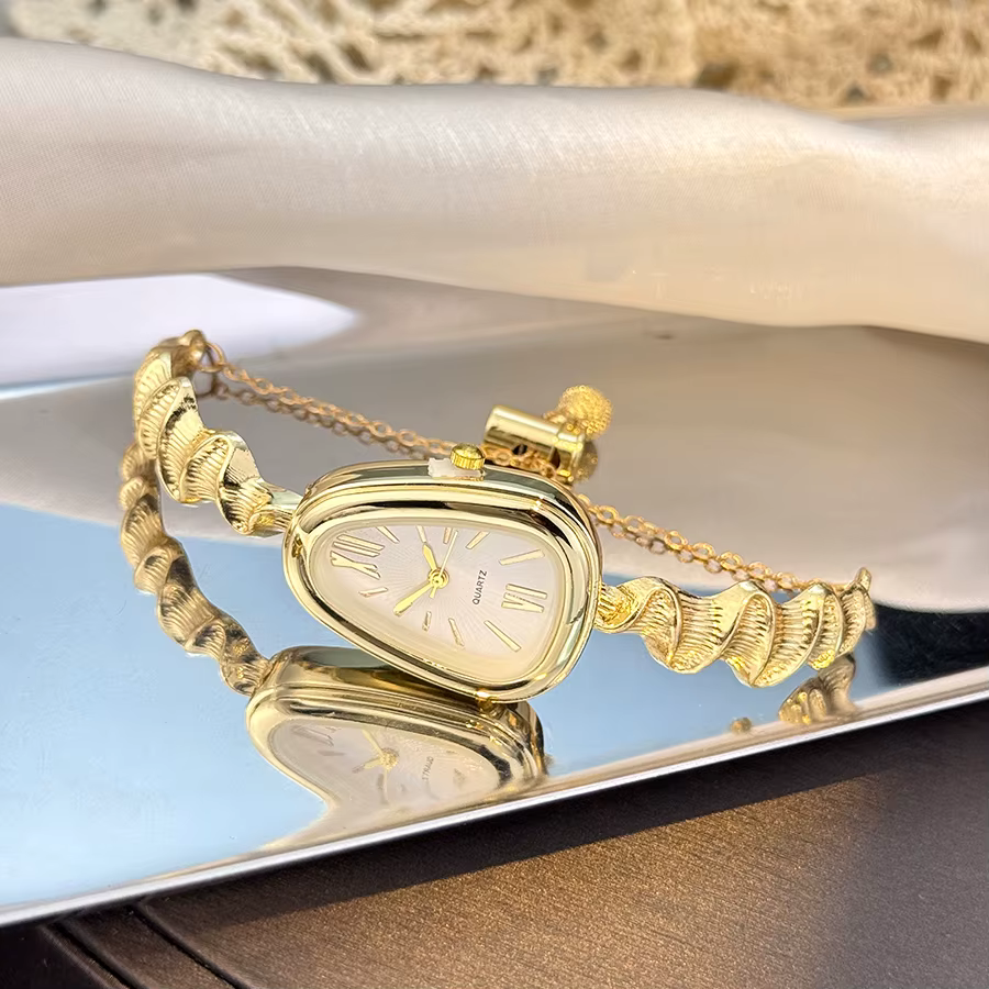 Montre à Quartz élégante en forme de serpent pour femmes