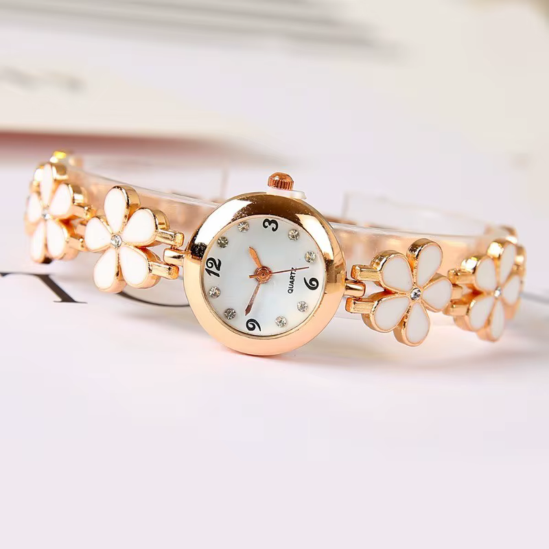 Montre à quartz élégante pour femme : design floral noir et rose - Idée cadeau parfaite pour toutes les occasions