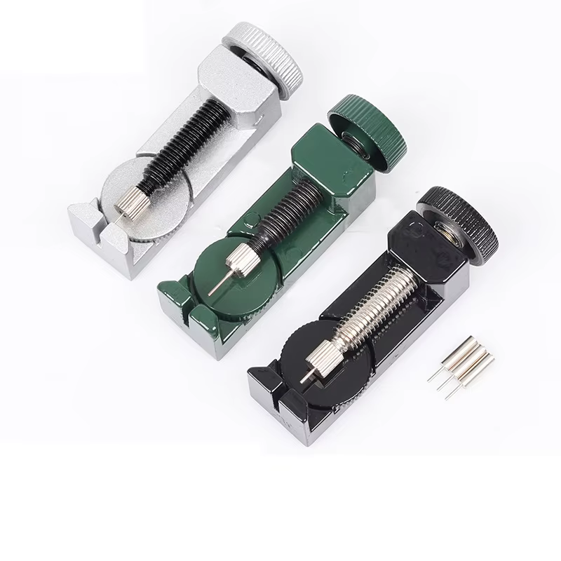 Ajusteur de bracelet de montre avec goupille