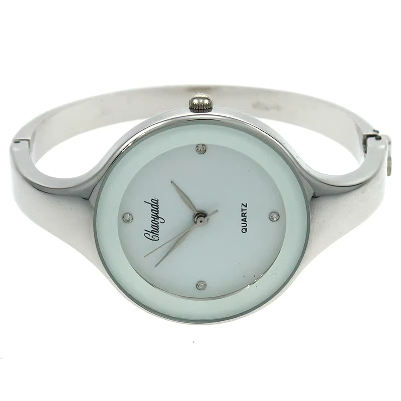 Montre manchette en acier inoxydable doré pour femme