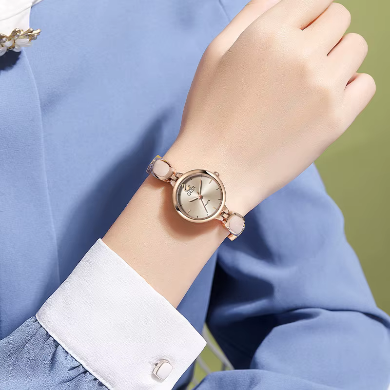 Montre pour femme Style chinois Bracelet montres rose oie Logo Image haute qualité étanche