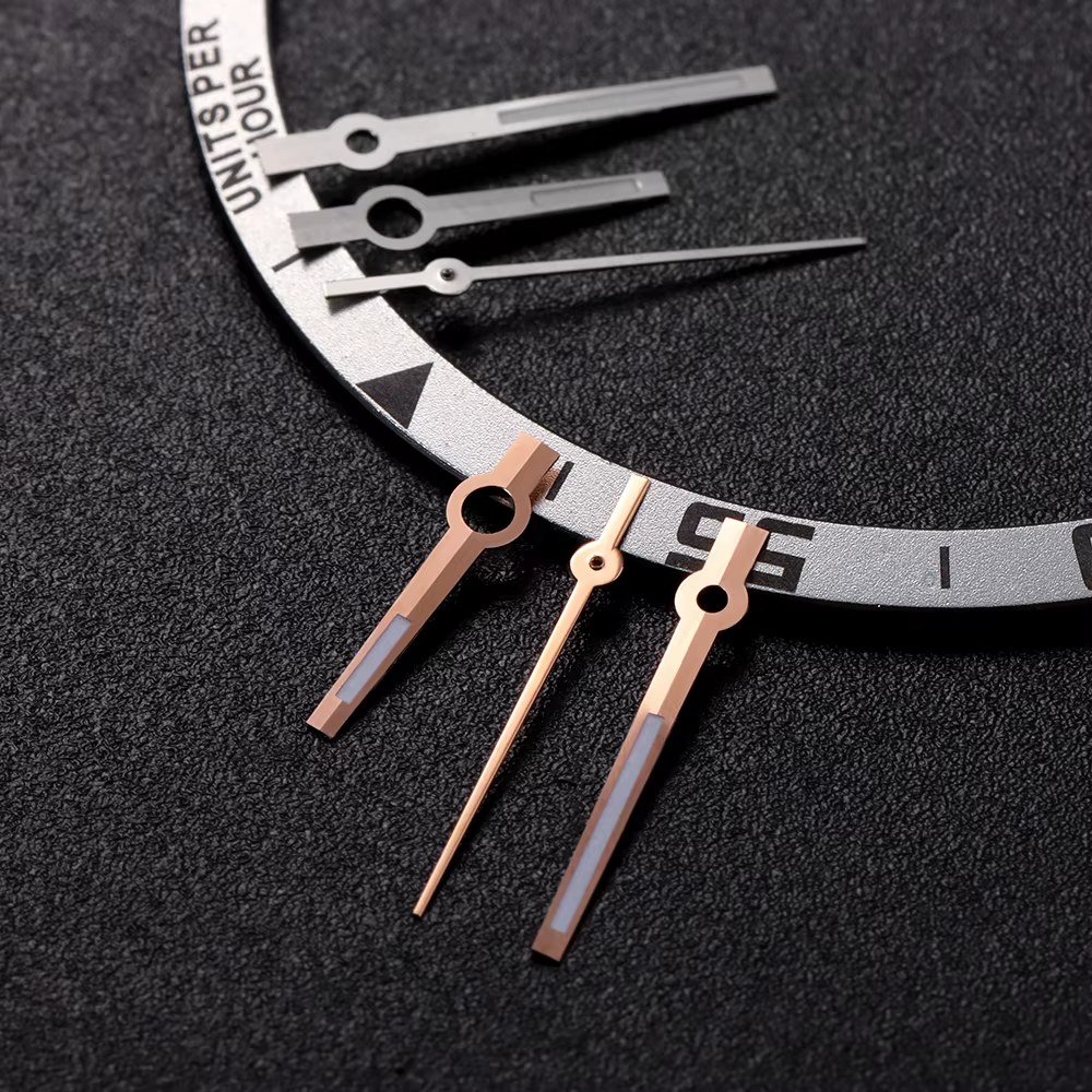 Aiguilles de montre en or rose