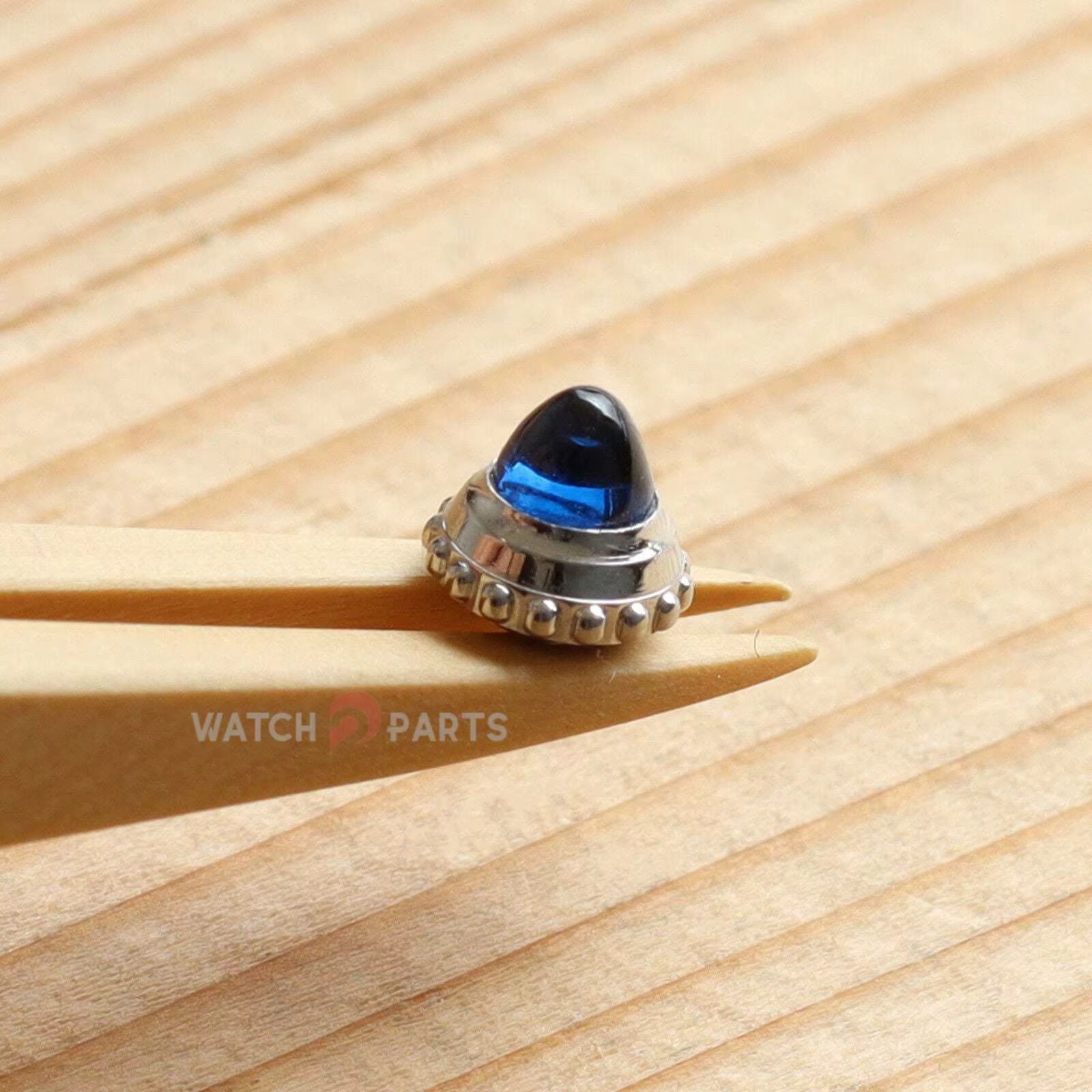 Petite couronne de montre pour Cartier