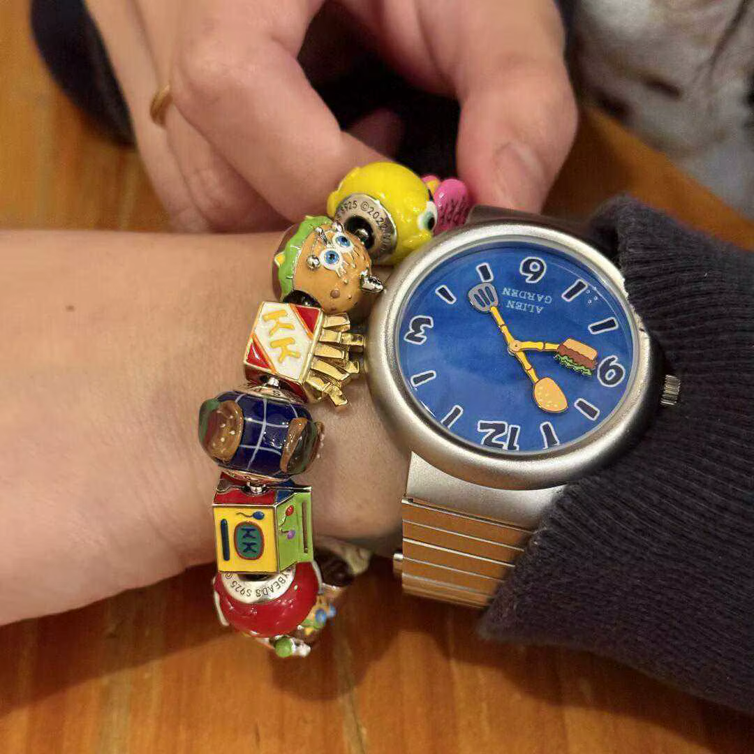 Montre à cadran de dessin animé pour hommes et femmes