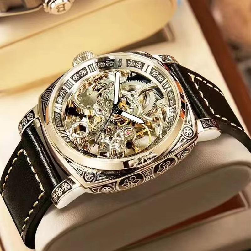 Une montre mécanique creuse à Tourbillon entièrement automatique sculptée lumineuse de Style d'affaires en alliage de Zinc noir pour hommes