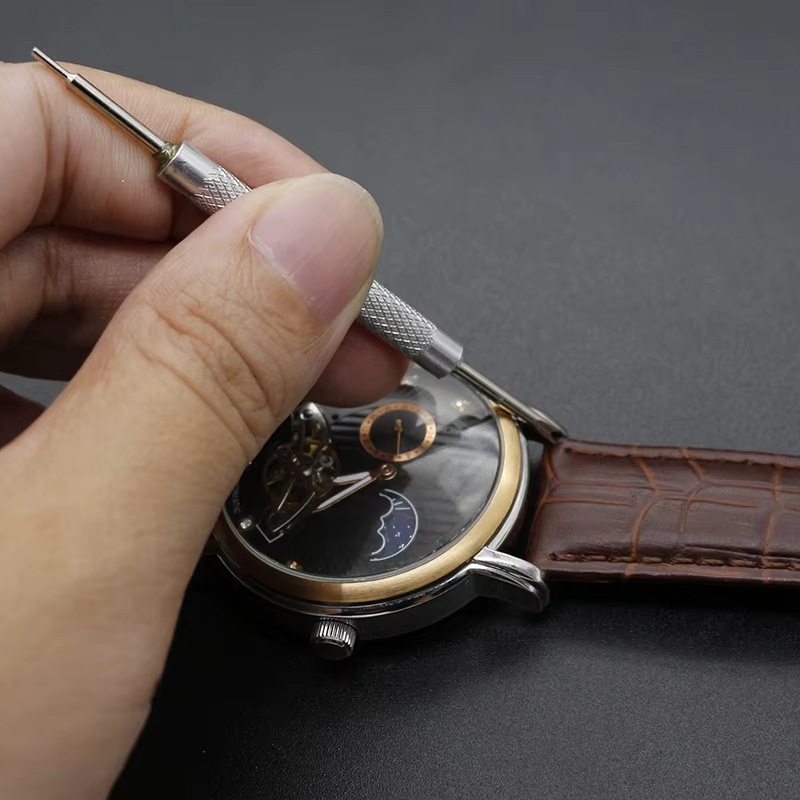 Outil de réparation de bracelet de montre en métal