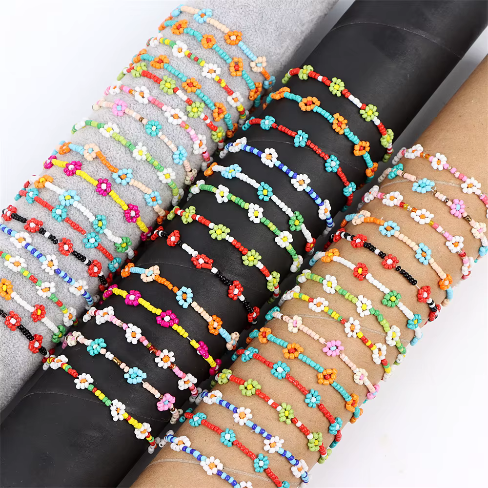 Bracelet en perles de fleur de marguerite pour femmes, 12 pièces/lot, mélange de couleurs, élastique, extensible, fait à la main, bijoux
