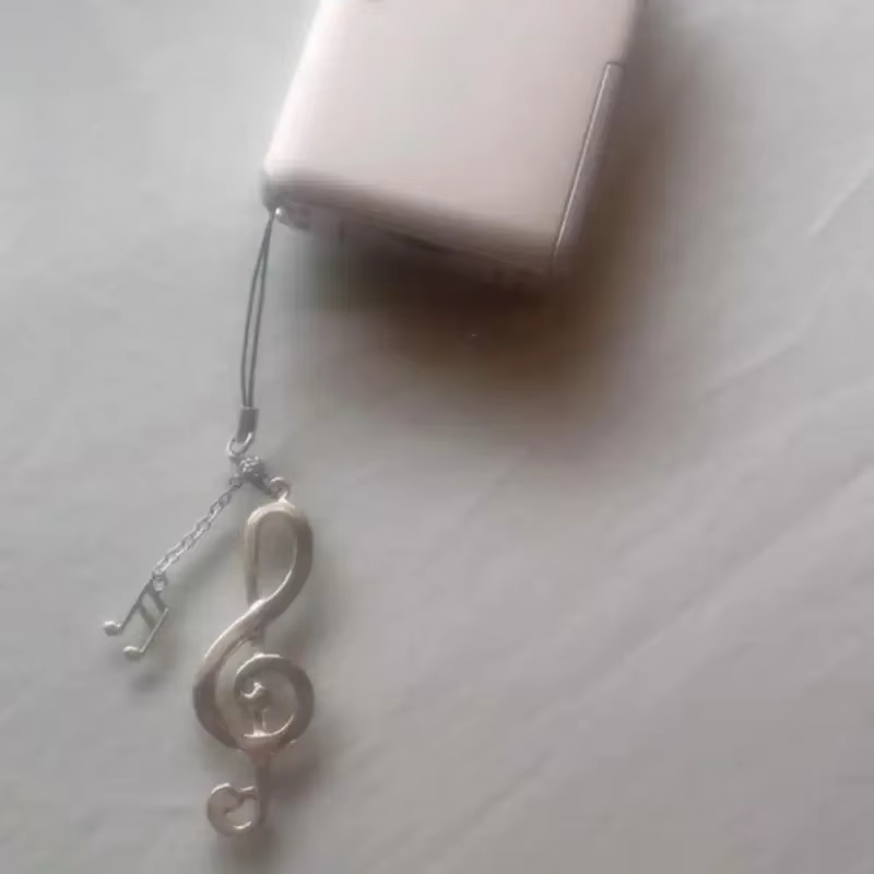 Vibrant clés anneau Musical Note Pendant Élégant Note musique élégante Accessoire Accessoire Mignon en alliage Charme P9yf