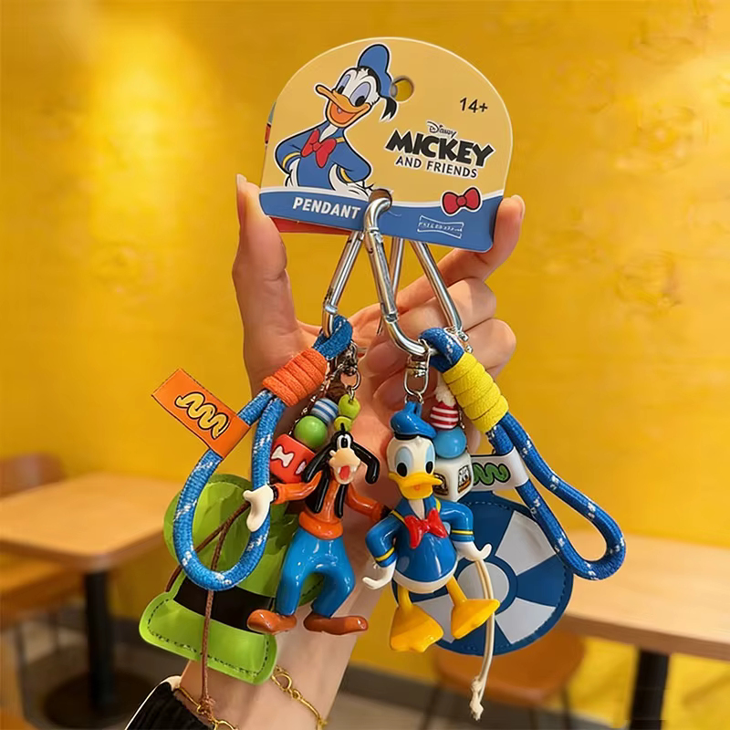 Porte-clés Disney authentique avec poupée Minnie et pendentif Donald Duck, accessoire mignon pour téléphone portable, petite idée cadeau