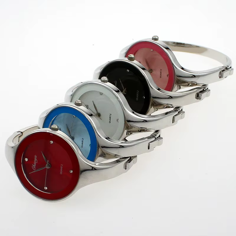 Montre manchette en acier inoxydable doré pour femme