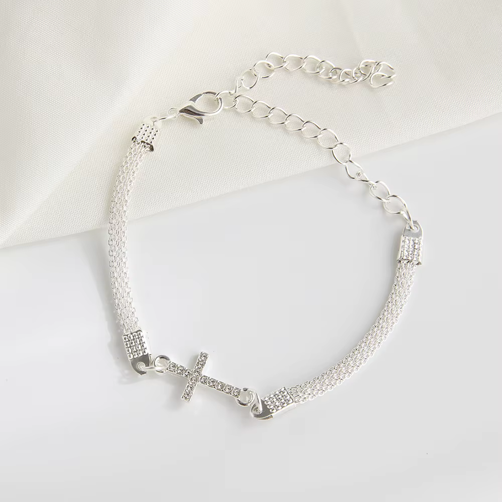 Bracelet en alliage avec strass en forme de croix